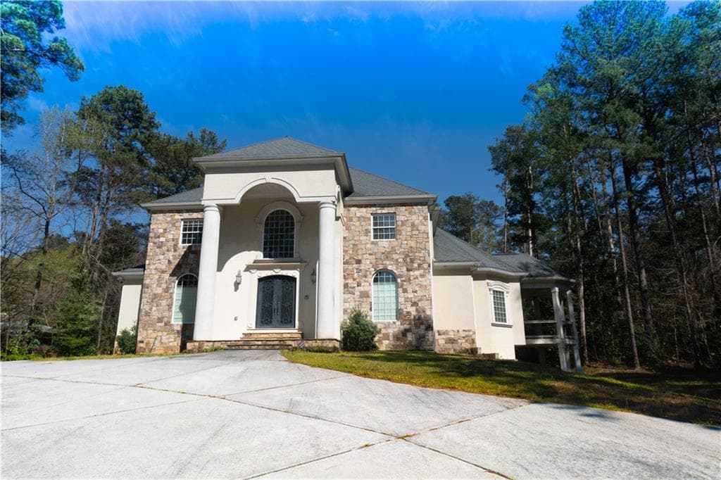 7 bedroom, 7 bathroom, 7,500 sq ft single family residence sold at 1910 Wallace Road, Atlanta, GA 30331