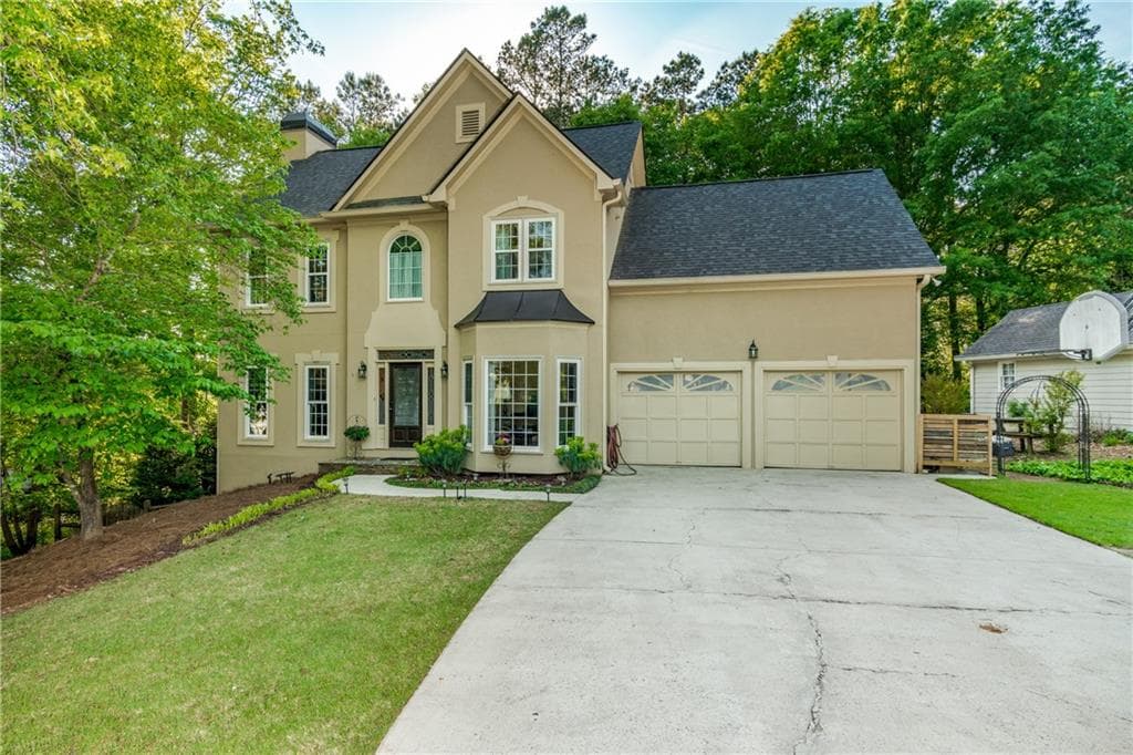 4 bedroom, 3 bathroom, 3,084 sq ft single family residence sold at 1722 Indian Ridge Drive, Woodstock, GA 30189