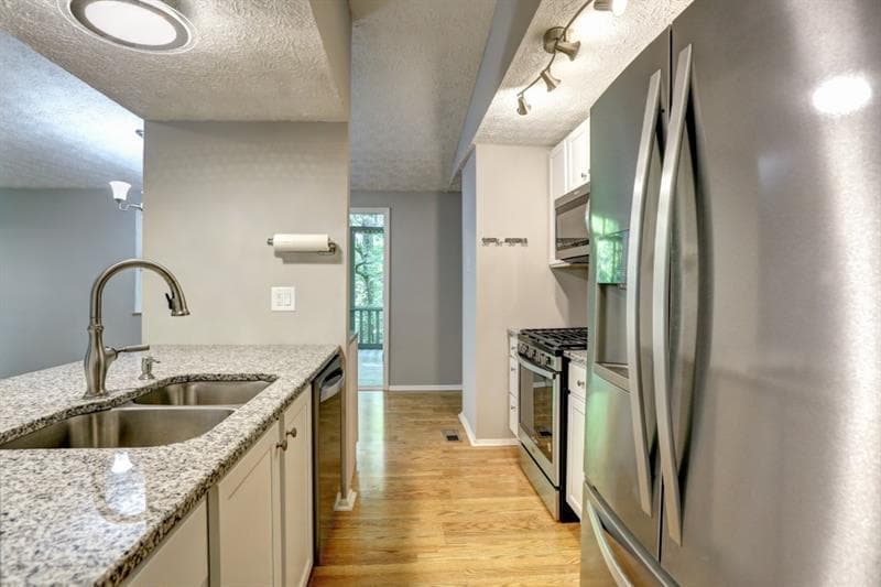 3 bedroom, 2 bathroom, 1,188 sq ft single family residence sold at 430 Hembree Forest Circle, Roswell, GA 30076