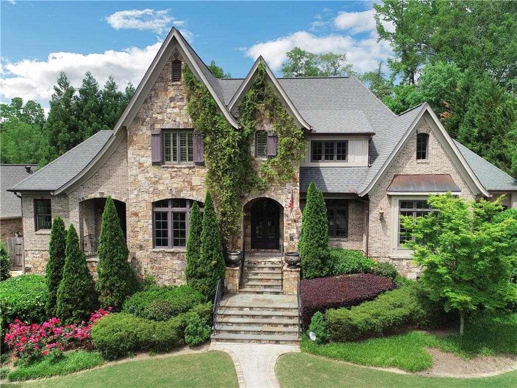 7 bedroom, 9 bathroom, 8,544 sq ft single family residence sold at 14 Laurel Drive, Atlanta, GA 30342