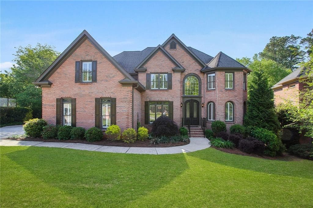 5 bedroom, 4 bathroom, 3,829 sq ft single family residence sold at 902 Stream Valley Trail, Alpharetta, GA 30022