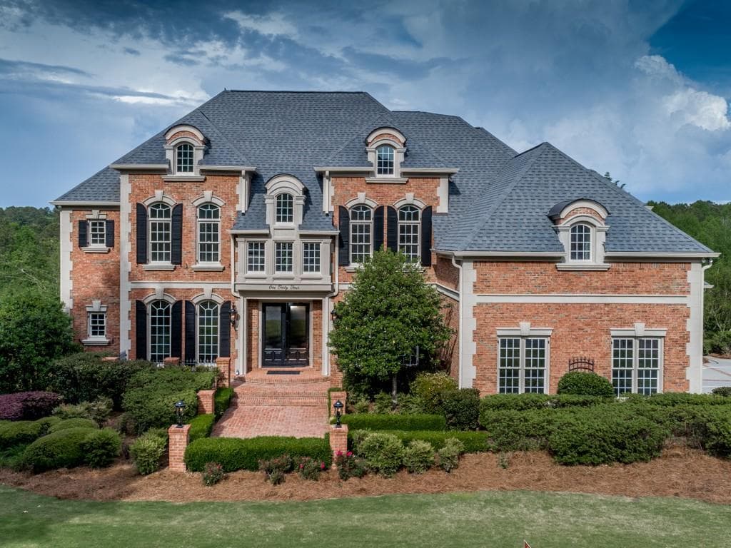6 bedroom, 7 bathroom, 9,204 sq ft single family residence sold at 144 Cedar Woods Trail, Canton, GA 30114