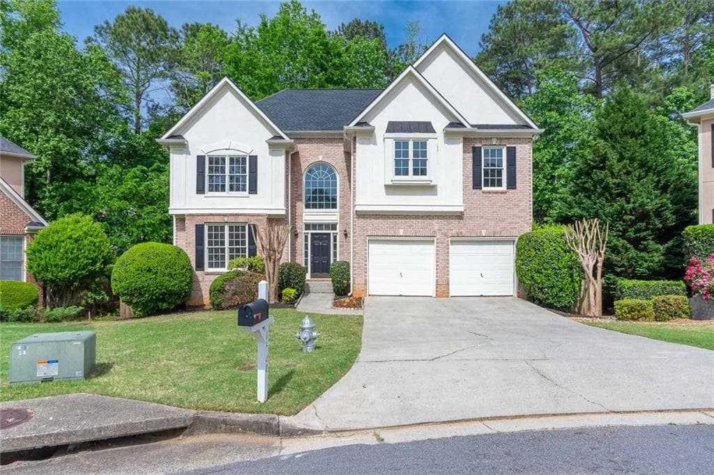 4 bedroom, 3 bathroom, 2,888 sq ft single family residence sold at 1502 Welch Court, Suwanee, GA 30024