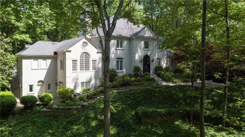 5 bedroom, 5 bathroom, 5,100 sq ft single family residence sold at 115 Jett Forest Court, Atlanta, GA 30327