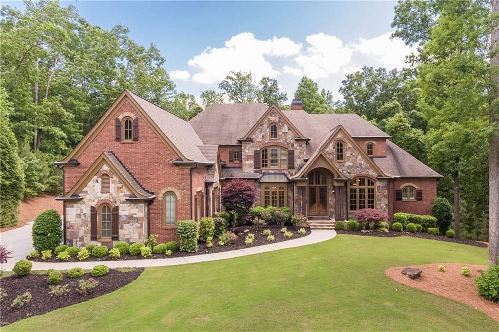 5 bedroom, 6 bathroom, 8,664 sq ft single family residence sold at 242 Traditions Drive, Alpharetta, GA 30004