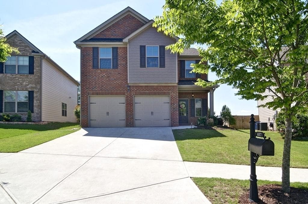 5 bedroom, 3 bathroom, 2,609 sq ft single family residence sold at 407 Payne Road, Woodstock, GA 30188