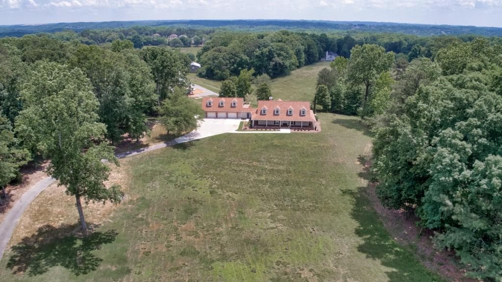 6 bedroom, 4 bathroom, 3,883 sq ft single family residence sold at 1965 Southers Circle, Suwanee, GA 30024