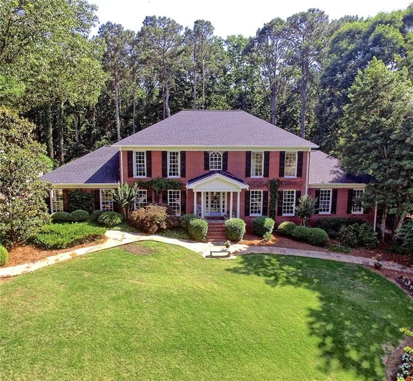 5 bedroom, 6 bathroom, 5,481 sq ft single family residence sold at 8915 Huntcliff Lake Court, Atlanta, GA 30350