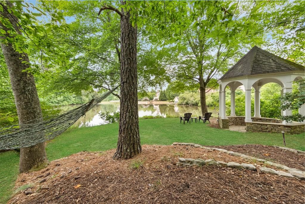 5 bedroom, 7 bathroom, 6,823 sq ft single family residence sold at 972 MOORES WALK Lane, Suwanee, GA 30024