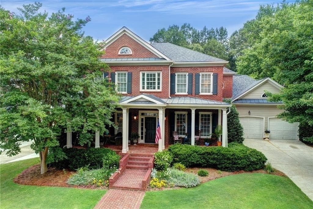 5 bedroom, 7 bathroom, 6,415 sq ft single family residence sold at 941 Moores Walk Lane, Suwanee, GA 30024