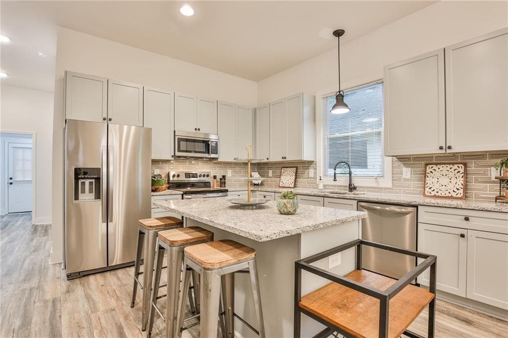 4 bedroom, 3 bathroom, 2,100 sq ft single family residence sold at 489 Culberson Street, Atlanta, GA 30310