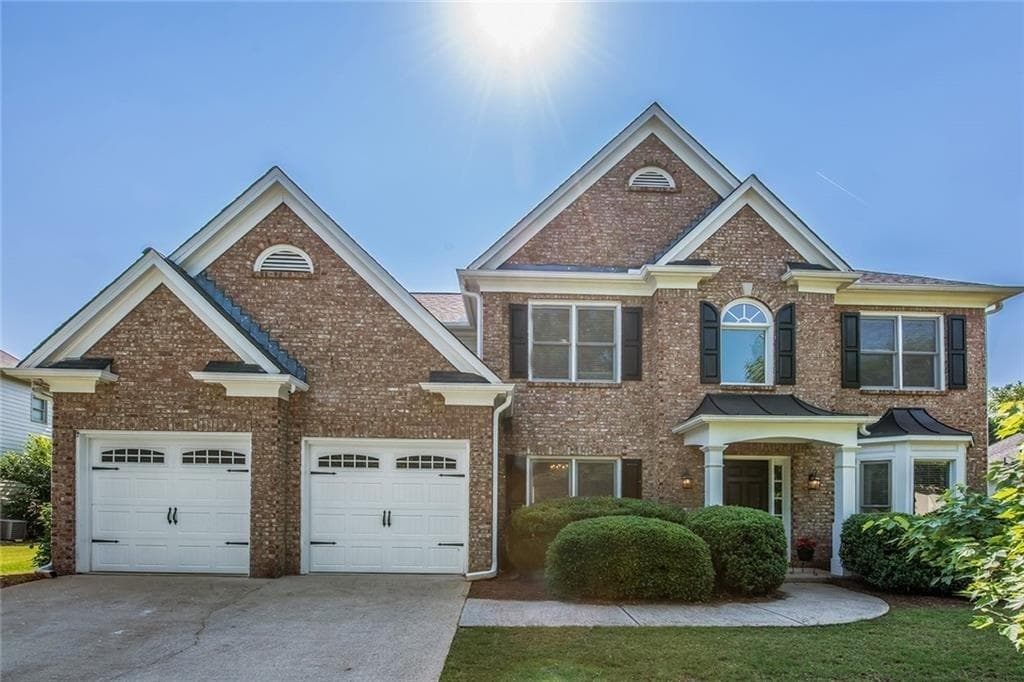 5 bedroom, 3 bathroom, 2,732 sq ft single family residence sold at 11025 Regal Forest Drive, Johns Creek, GA 30024