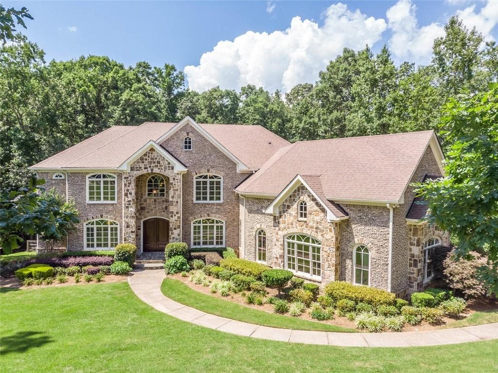 6 bedroom, 7 bathroom, 9,662 sq ft single family residence sold at 3965 Fouts Drive, Cumming, GA 30028