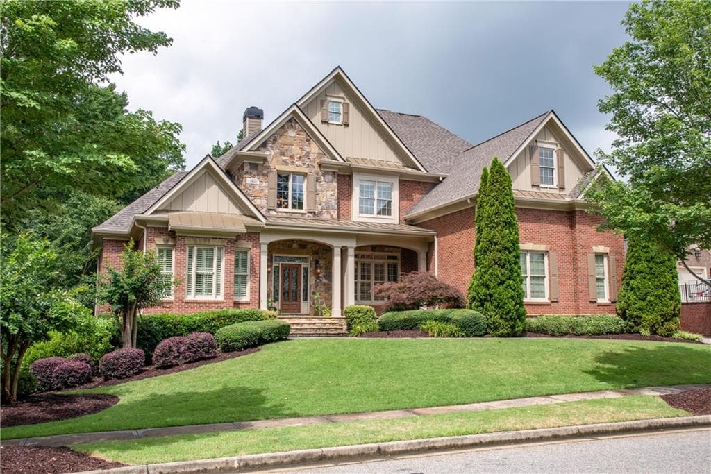 6 bedroom, 5 bathroom, 6,331 sq ft single family residence sold at 2879 Hidden Falls Drive, Buford, GA 30519