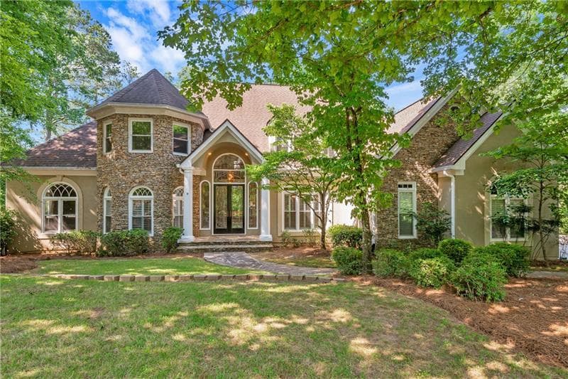 6 bedroom, 6 bathroom, 7,218 sq ft single family residence sold at 240 Wicklawn Way, Roswell, GA 30076