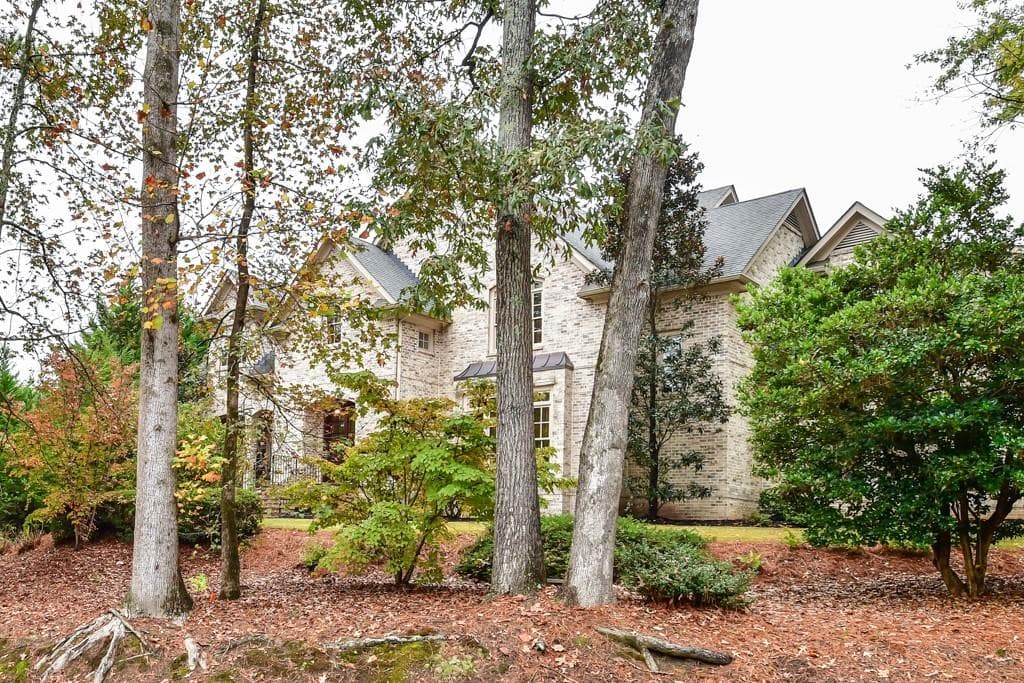 5 bedroom, 6 bathroom, 7,339 sq ft single family residence sold at 4141 Valley Creek Drive, Atlanta, GA 30339