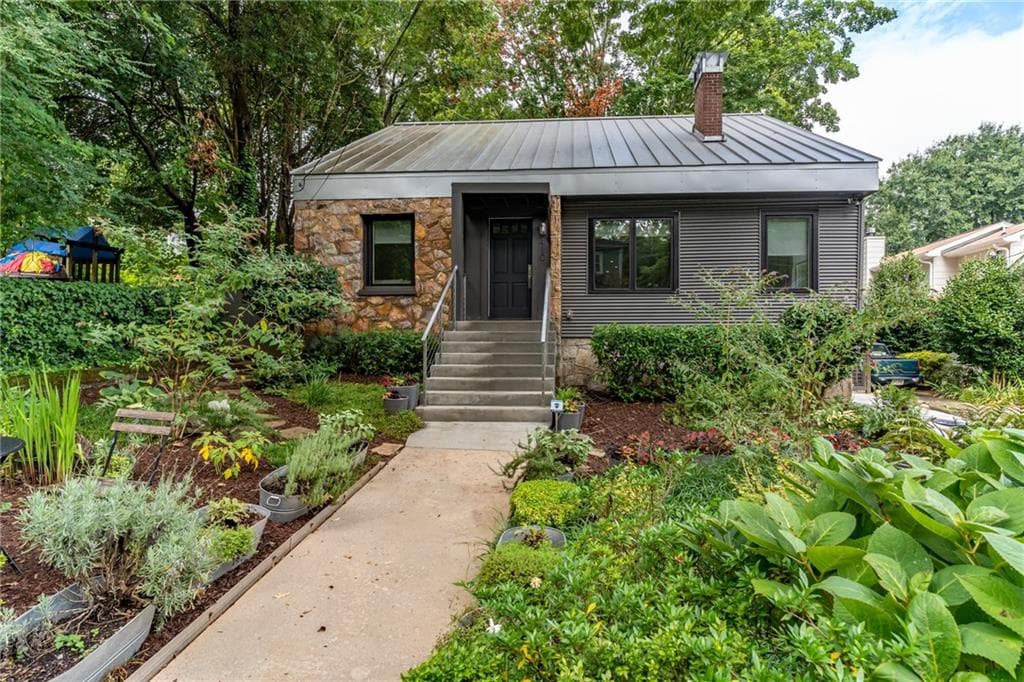 4 bedroom, 3 bathroom, 2,100 sq ft single family residence sold at 410 Leonardo Avenue, Atlanta, GA 30307