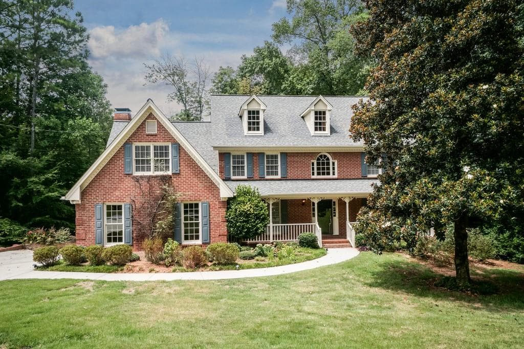 5 bedroom, 3 bathroom, 3,377 sq ft single family residence sold at 5711 Wolf Laurel Lane, Lilburn, GA 30047