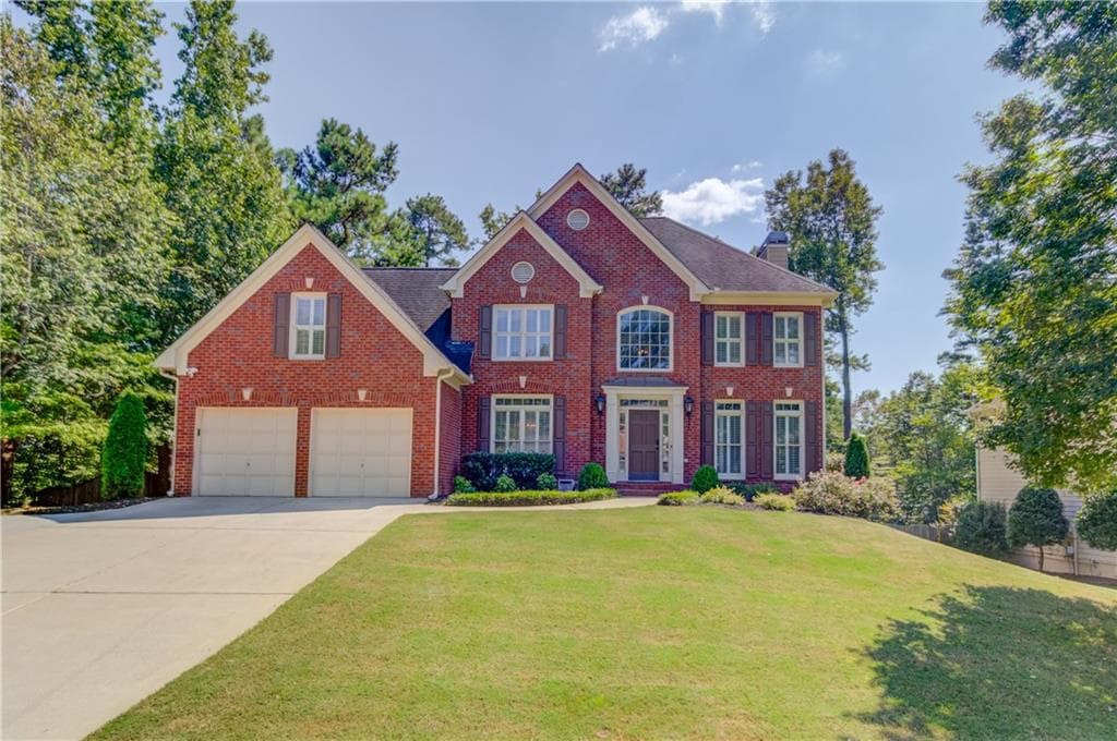 6 bedroom, 5 bathroom, 4,112 sq ft single family residence sold at 1388 Pointview Court, Suwanee, GA 30024