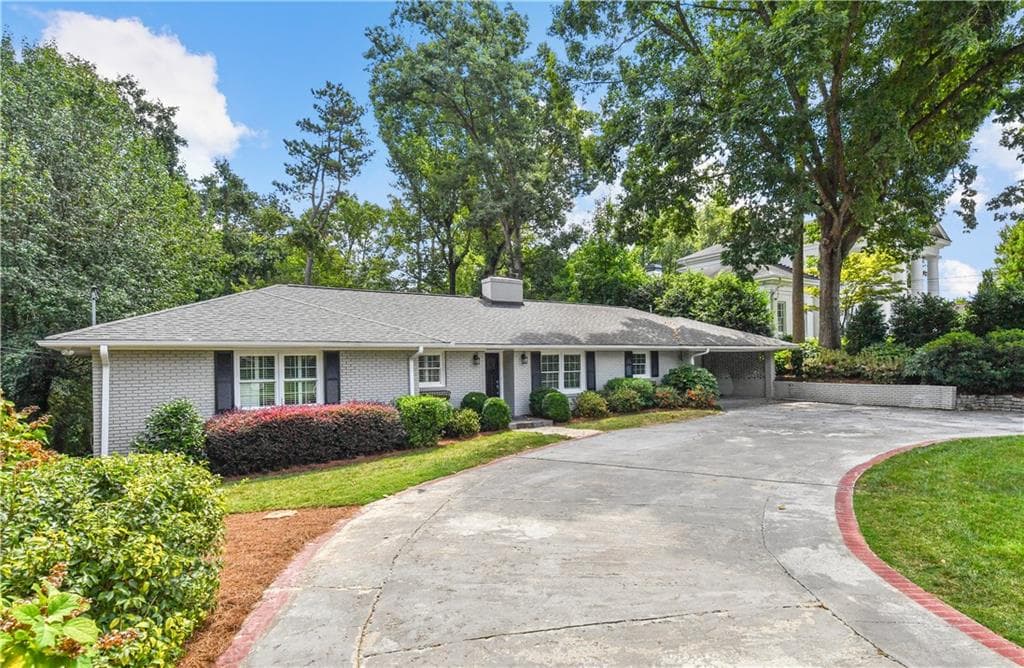 4 bedroom, 5 bathroom, 3,382 sq ft single family residence sold at 4675 Lake Forrest Drive, Atlanta, GA 30342