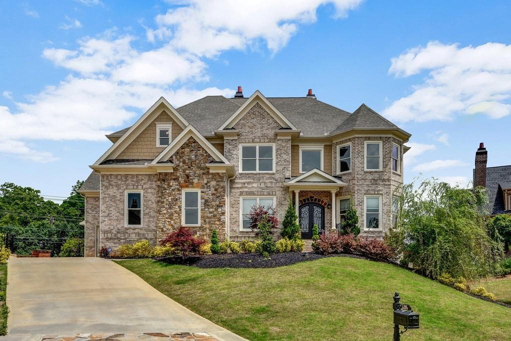 6 bedroom, 5 bathroom, 5,381 sq ft single family residence sold at 5395 Lacosta Lane, Alpharetta, GA 30022