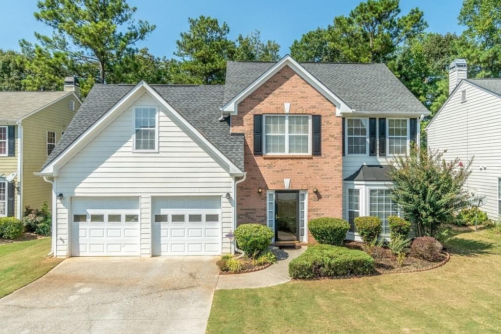 4 bedroom, 3 bathroom, 2,094 sq ft single family residence sold at 2220 STONEOAK Drive, Lawrenceville, GA 30043