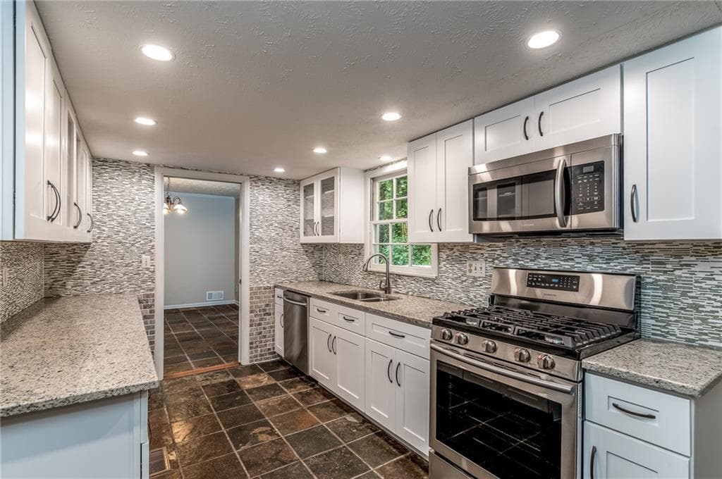 4 bedroom, 3 bathroom single family residence sold at 4586 Hunting Hound Lane, Marietta, GA 30062 — photo 1 of 1