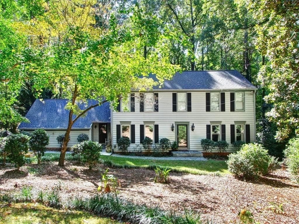 5 bedroom, 4 bathroom, 3,691 sq ft single family residence sold at 4977 Mountclaire Road, Stone Mountain, GA 30087