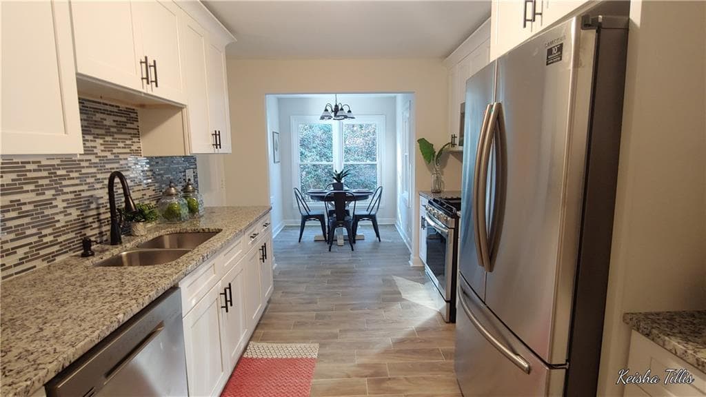 7 bedroom, 3 bathroom, 3,600 sq ft single family residence sold at 2165 Barge Road, Atlanta, GA 30331