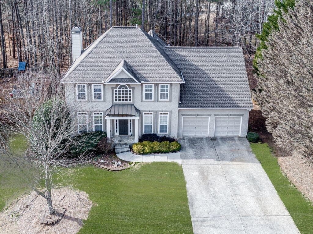 4 bedroom, 3 bathroom, 3,185 sq ft single family residence sold at 705 Tall Oaks Drive, Canton, GA 30114