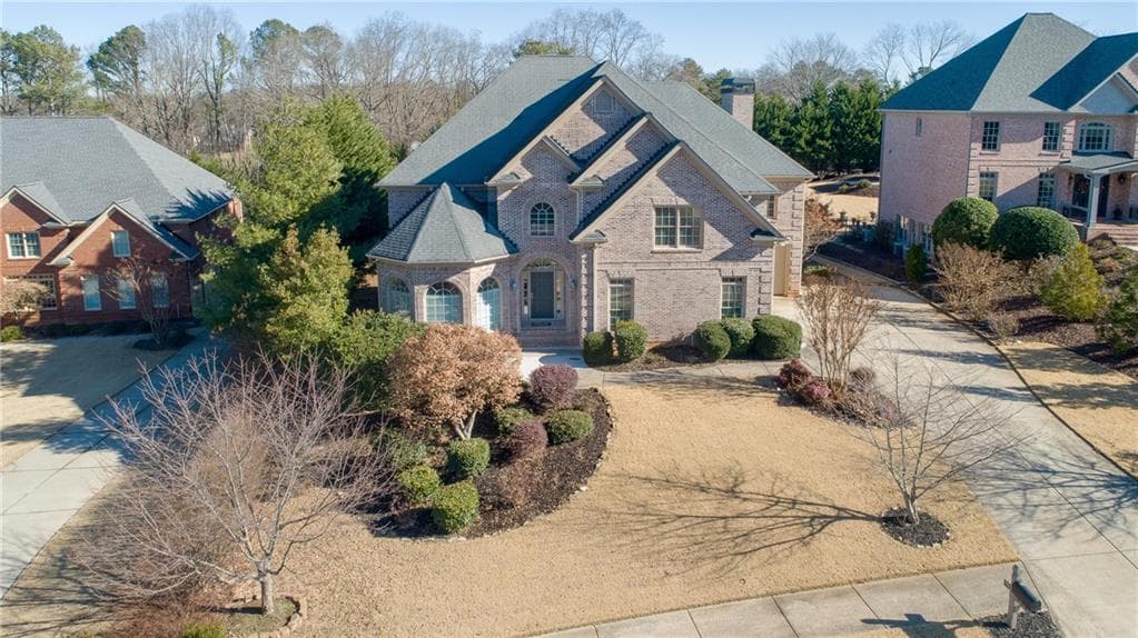 6 bedroom, 5 bathroom, 6,843 sq ft single family residence sold at 208 Woodridge Parkway, Canton, GA 30115