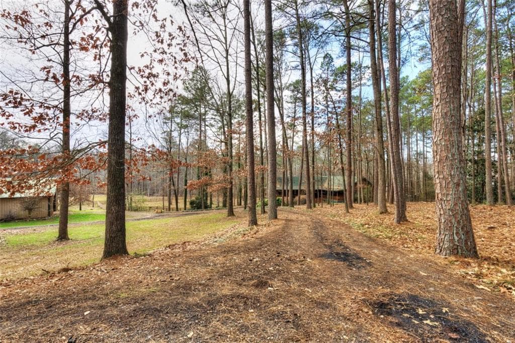 4 bedroom, 3 bathroom, 2,604 sq ft single family residence sold at 667 Still Branch Drive, Canton, GA 30115