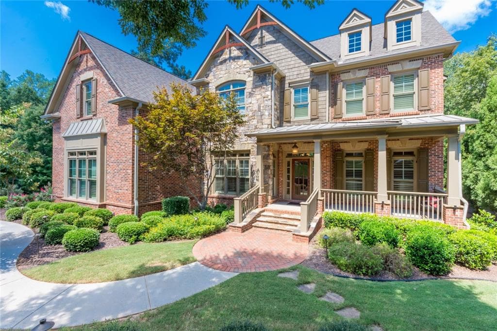 6 bedroom, 6 bathroom, 5,953 sq ft single family residence sold at 5730 Windjammer Point, Cumming, GA 30041
