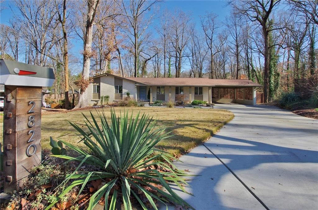 4 bedroom, 3 bathroom, 2,561 sq ft single family residence sold at 2820 Overlook Drive, Atlanta, GA 30345