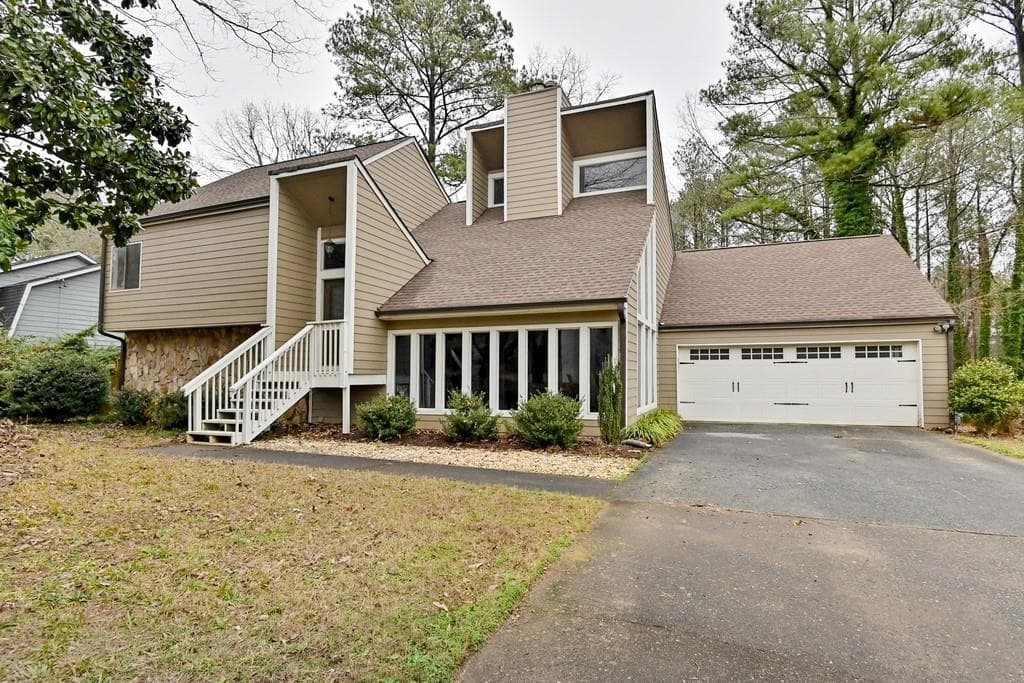 4 bedroom, 4 bathroom, 2,848 sq ft single family residence sold at 4977 McPherson Drive, Roswell, GA 30075