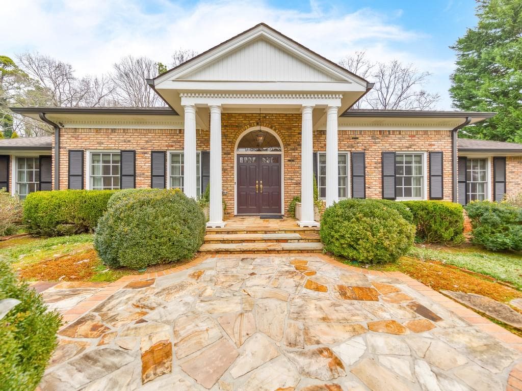5 bedroom, 5 bathroom, 5,181 sq ft single family residence sold at 235 Forrest Lake Drive, Atlanta, GA 30327