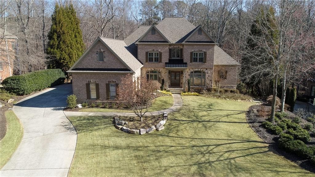 6 bedroom, 9 bathroom, 9,422 sq ft single family residence sold at 2390 Flint Creek Drive, Cumming, GA 30041