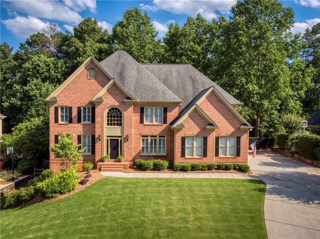 6 bedroom, 5 bathroom, 5,977 sq ft single family residence sold at 1060 Creek Ridge Pointe, Alpharetta, GA 30005