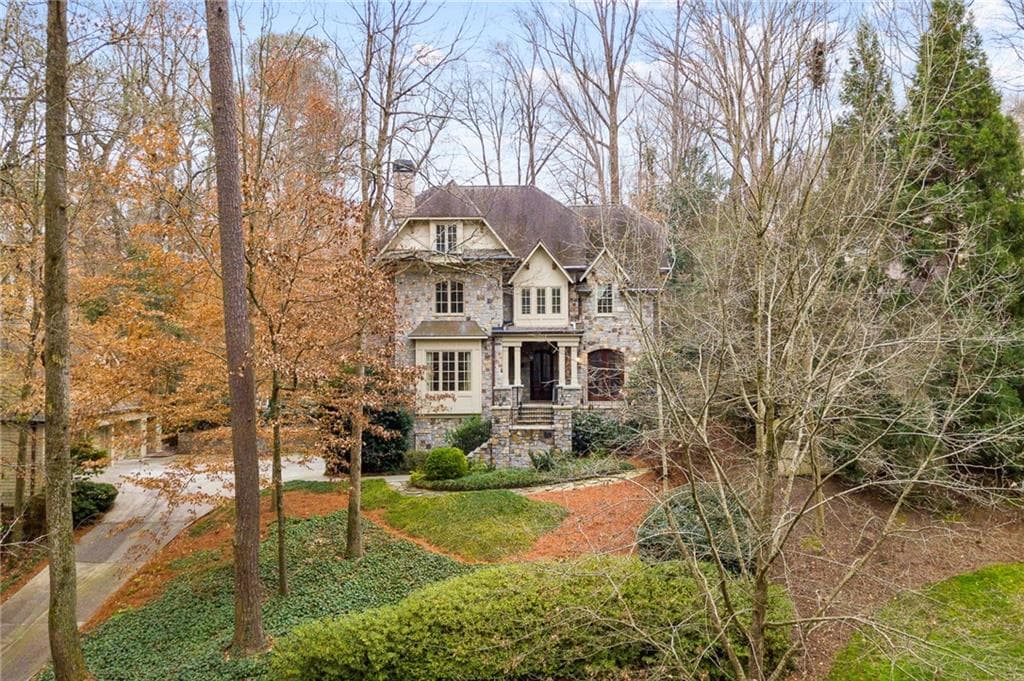 5 bedroom, 7 bathroom, 7,104 sq ft single family residence sold at 1050 Dawn View Lane, Atlanta, GA 30327