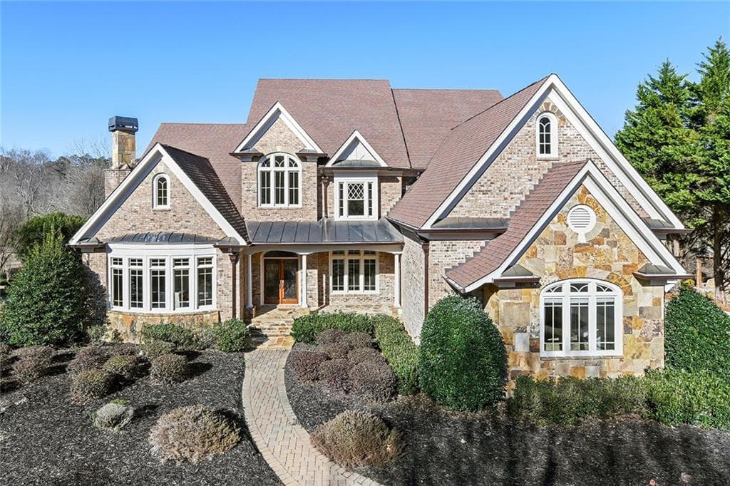 5 bedroom, 7 bathroom, 7,729 sq ft single family residence sold at 15884 Meadow King Court, Milton, GA 30004
