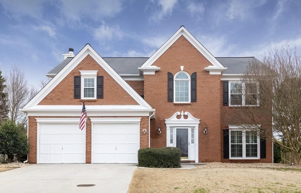 4 bedroom, 3 bathroom, 2,332 sq ft single family residence sold at 7705 Sherringate Drive, Cumming, GA 30041