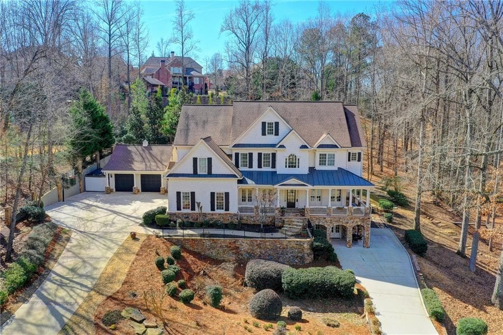 6 bedroom, 9 bathroom, 7,398 sq ft single family residence sold at 2340 Wood Cove Drive, Cumming, GA 30041