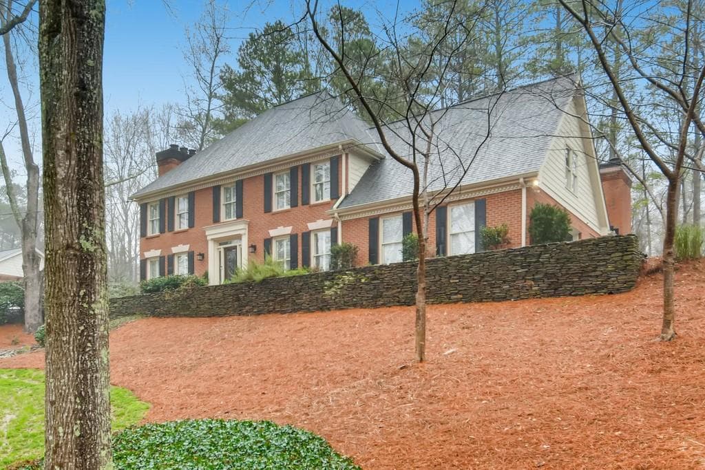 6 bedroom, 5 bathroom, 3,634 sq ft single family residence sold at 2570 Spalding Drive, Atlanta, GA 30350