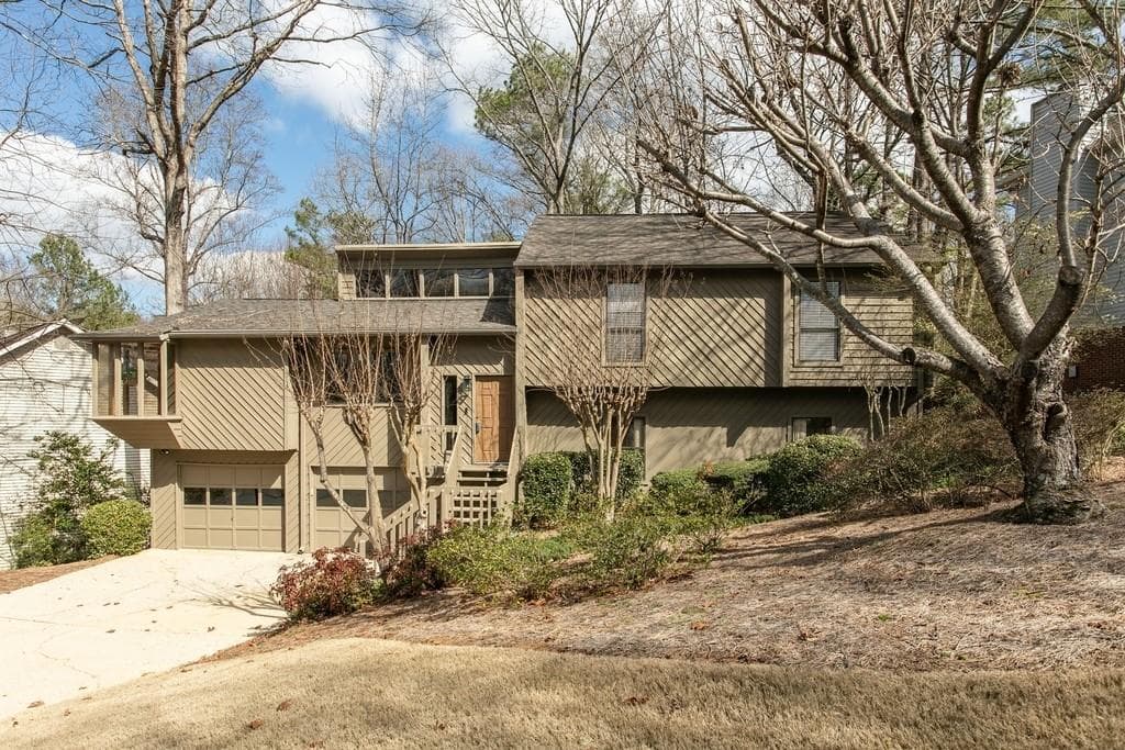 4 bedroom, 3 bathroom, 2,622 sq ft single family residence sold at 755 Wood Valley Trace, Roswell, GA 30076