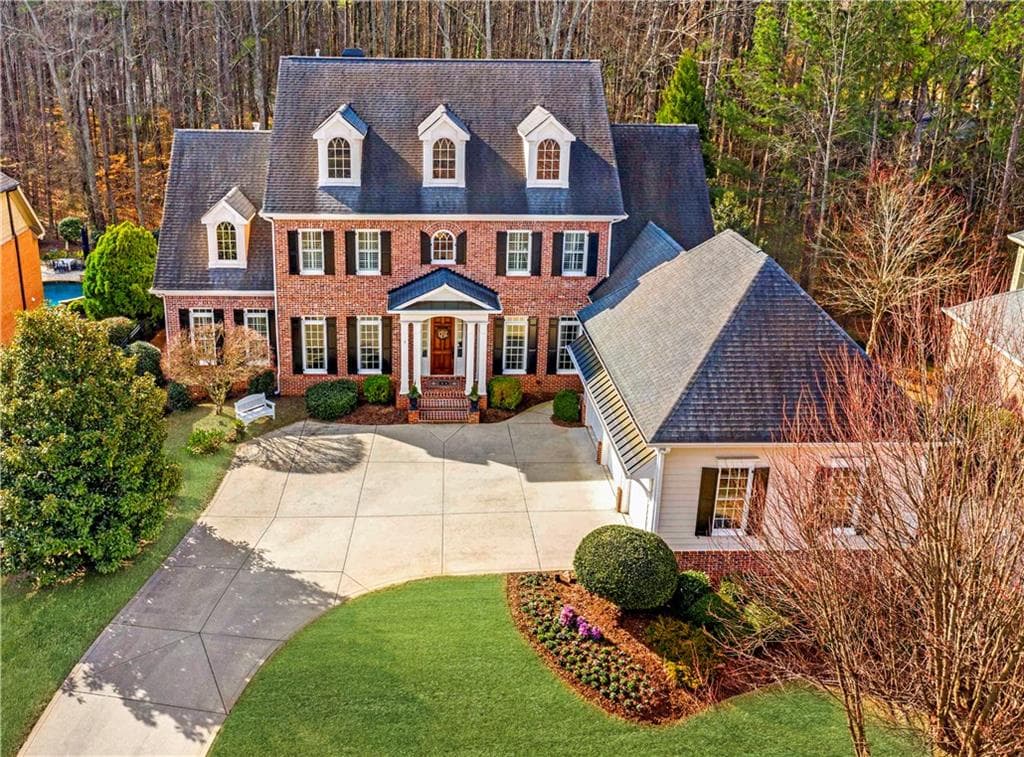 6 bedroom, 8 bathroom, 7,469 sq ft single family residence sold at 2418 Wistful Way, Marietta, GA 30066