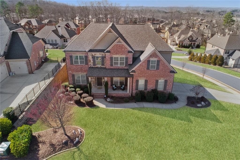 5 bedroom, 4 bathroom, 3,992 sq ft single family residence sold at 1705 Gables Bridge Crossing, Cumming, GA 30041
