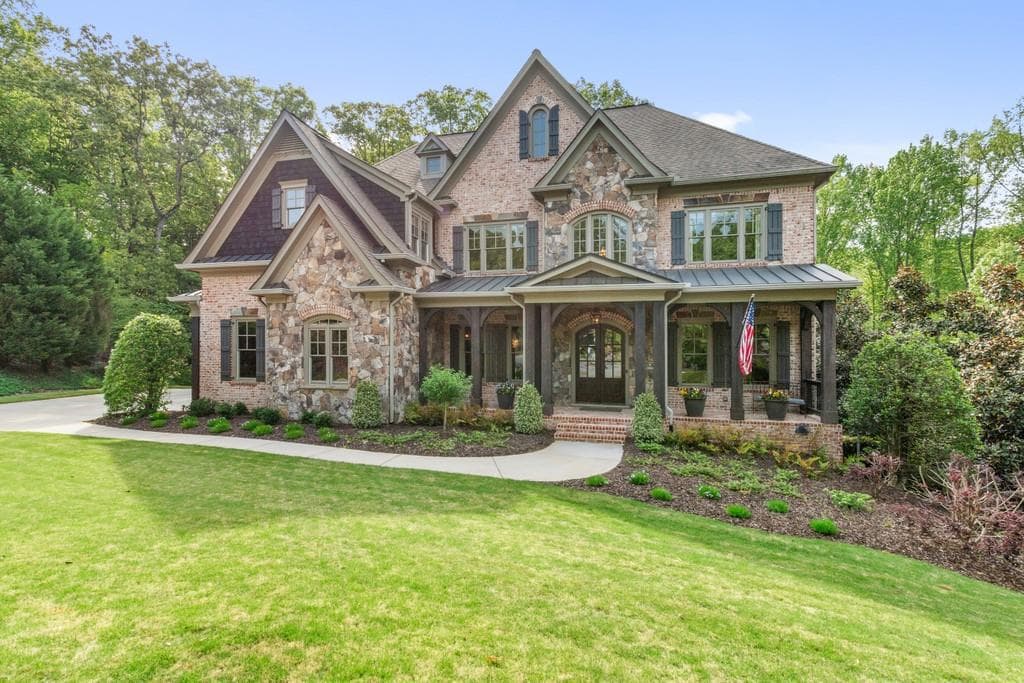 5 bedroom, 7 bathroom, 6,601 sq ft single family residence sold at 2455 Bute Cliff Trace, Cumming, GA 30041