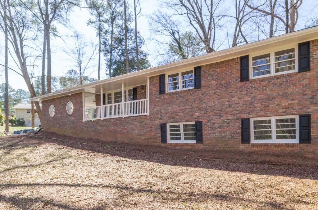 3 bedroom, 3 bathroom, 2,052 sq ft single family residence sold at 2911 Haralson Road, Decatur, GA 30033