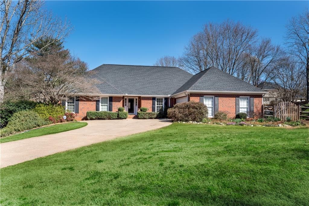 4 bedroom, 3 bathroom, 2,126 sq ft single family residence sold at 115 Glenclairn Court, Roswell, GA 30076