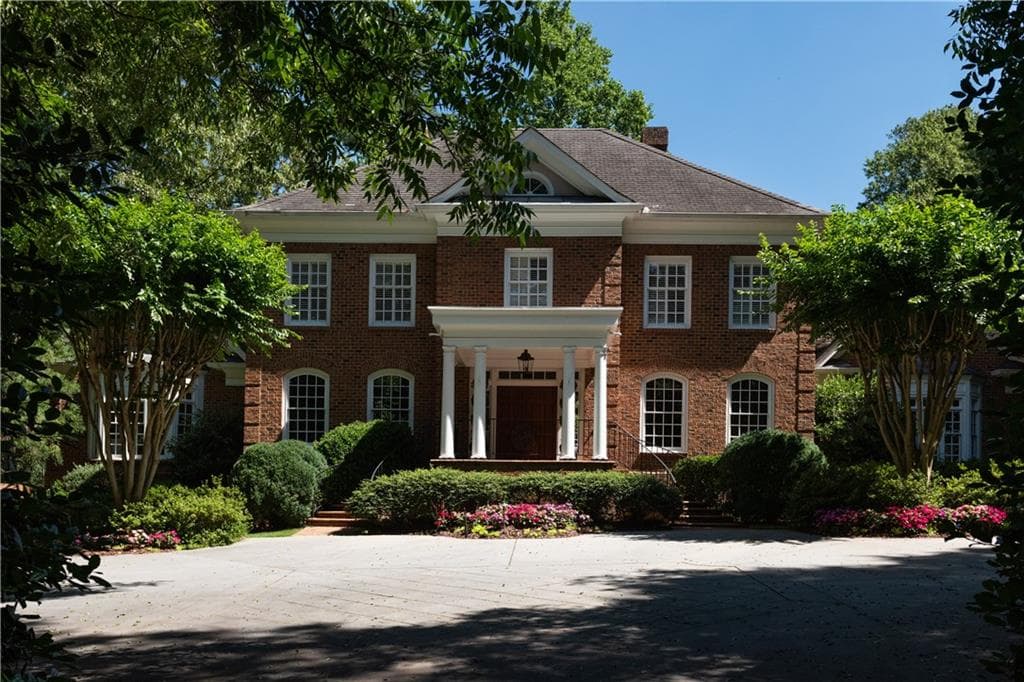 6 bedroom, 7 bathroom, 6,429 sq ft single family residence sold at 1063 W Paces Ferry Road, Atlanta, GA 30327